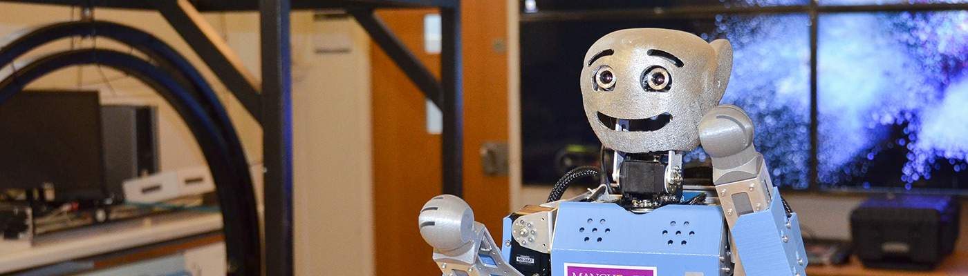 A smiling robot in the Robotics Laboratory