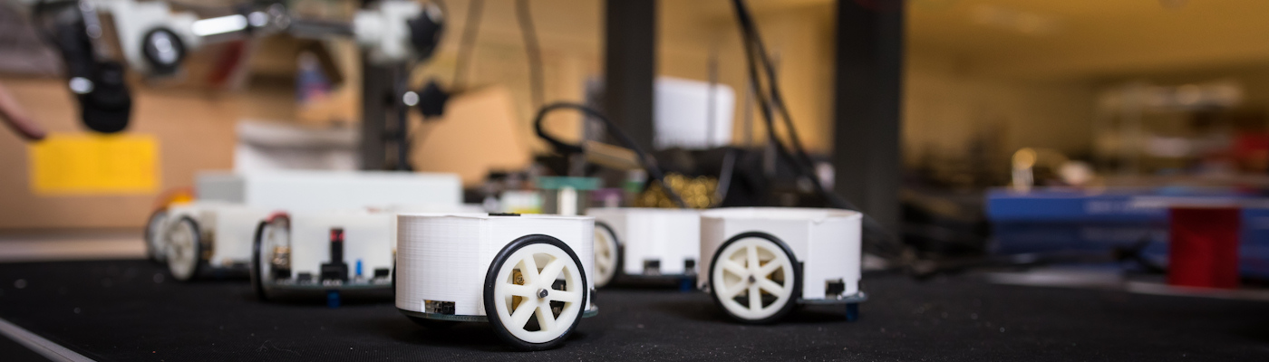 Robotic model on wheels in lab