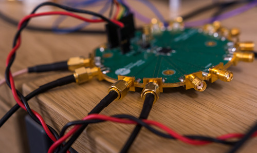 Co-axial cables going into a central connector on a table-top