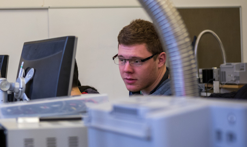 Student looking intently at a computer