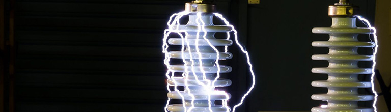 Light bulb with electricity sparking around it 